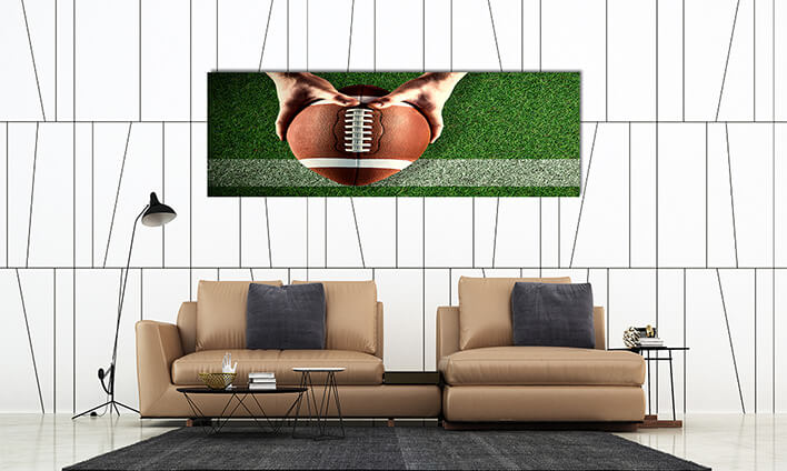 M10 0017 ML 0008 29149408 composite image of american football player holding up football AOAY2636