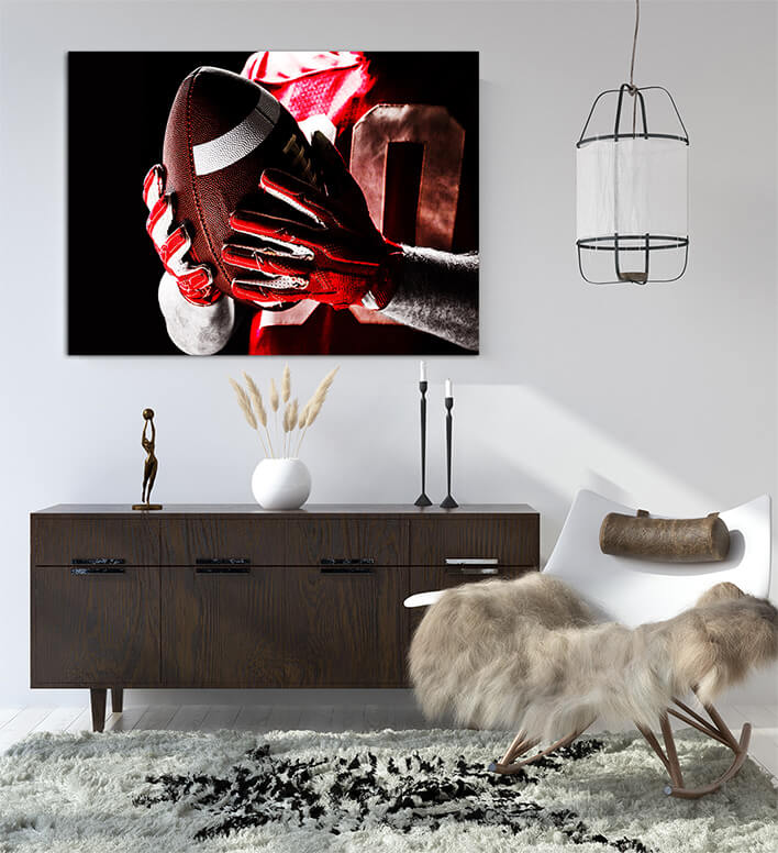 M1 0010 ML 0012 29750020 american football player holding rugby ball AOAY2671