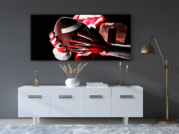 M3 0014 ML 0012 29750020 american football player holding rugby ball AOAY2671