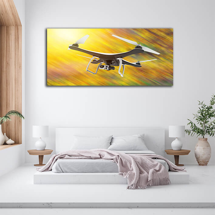 WEB002 0010 WEB001 0029 46105754 drone with digital camera flying on a yellow background AOAY5301