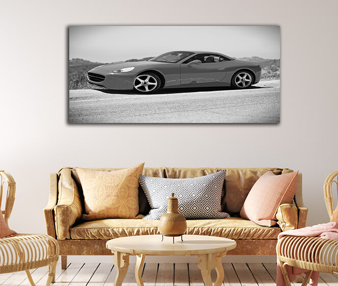 WEB003 0019 WEB001 0011 47289274 red cars go faster shot of a young woman driving in a sports car AOAY5194