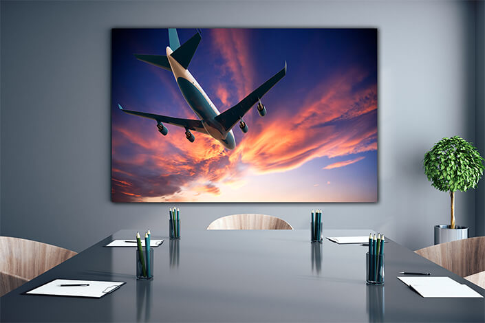 WEB004 0013 ML 0008 46061266 airplane flying in a cloudy sunset AOAY5275