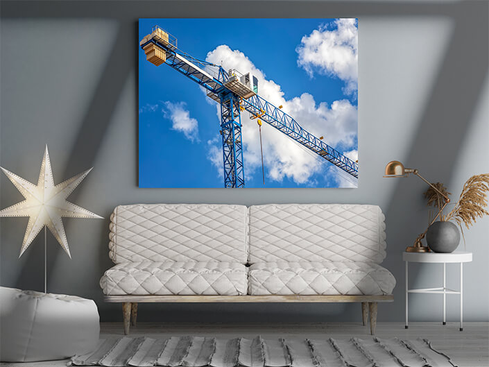WEB008 0032 ML 0004 46516938 construction tower crane with a cabin on blue sky with clouds bottom view AOAY4811