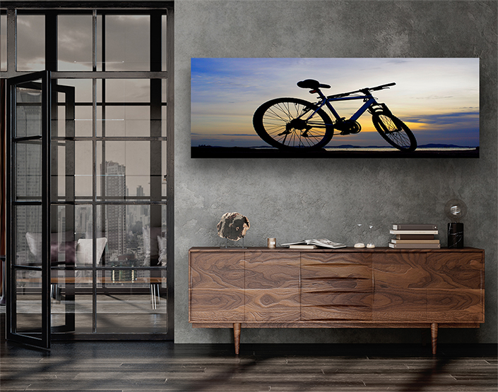 WEB004 0028 ML 0020 14253418 silhouette of mountain bike with sunset sky and island AOAY7084