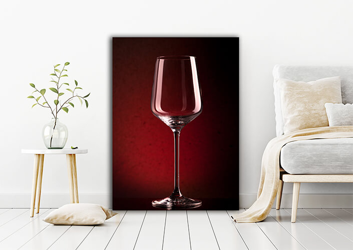 WEB002 0007 MP 0011 8099688 empty wineglass on red background AOAY7171