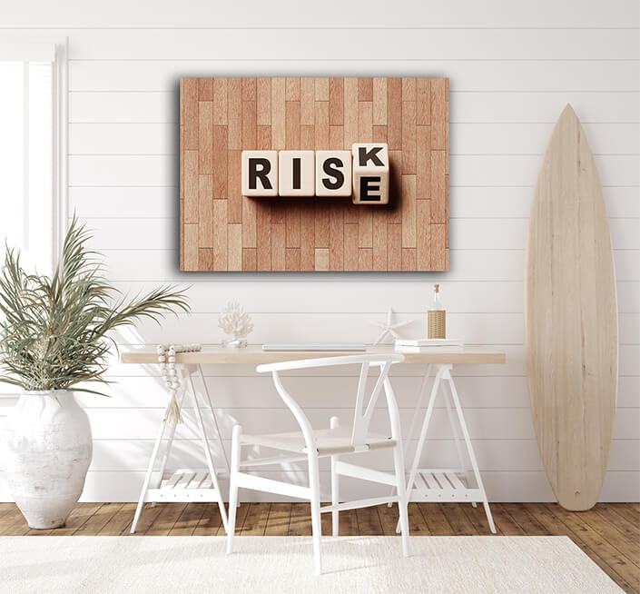 WEB002 0025 MP 0008 48167738 risk and rise wooden block cube on laminate floor financial risk management AOAY6172