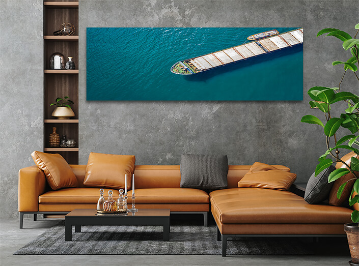 WEB003 0020 MP 0002 46629904 aerial shot of a cargo ship approaching port with help of towing ship AOAY4812