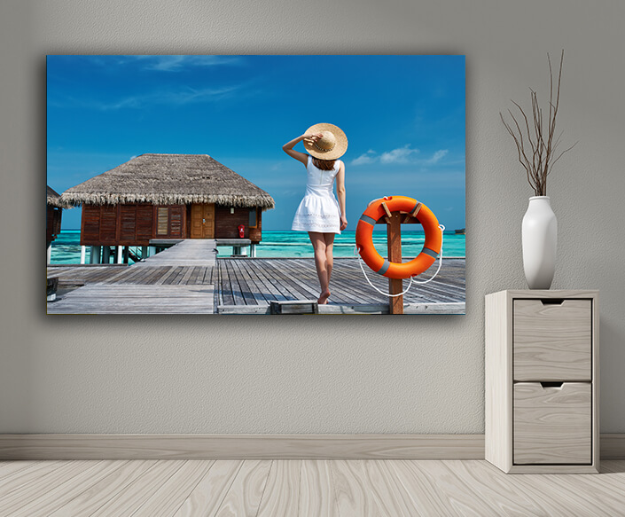 WEB004 0008 MP 0016 13621896 woman on a beach jetty at maldives AOAY6707