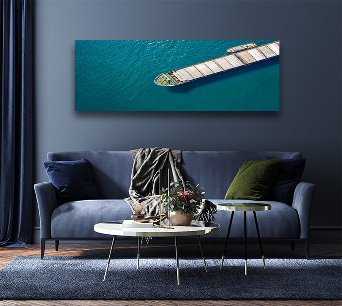 WEB004 0028 MP 0002 46629904 aerial shot of a cargo ship approaching port with help of towing ship AOAY4812