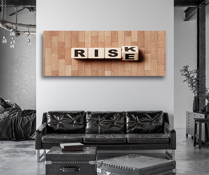 WEB005 0025 MP 0008 48167738 risk and rise wooden block cube on laminate floor financial risk management AOAY6172