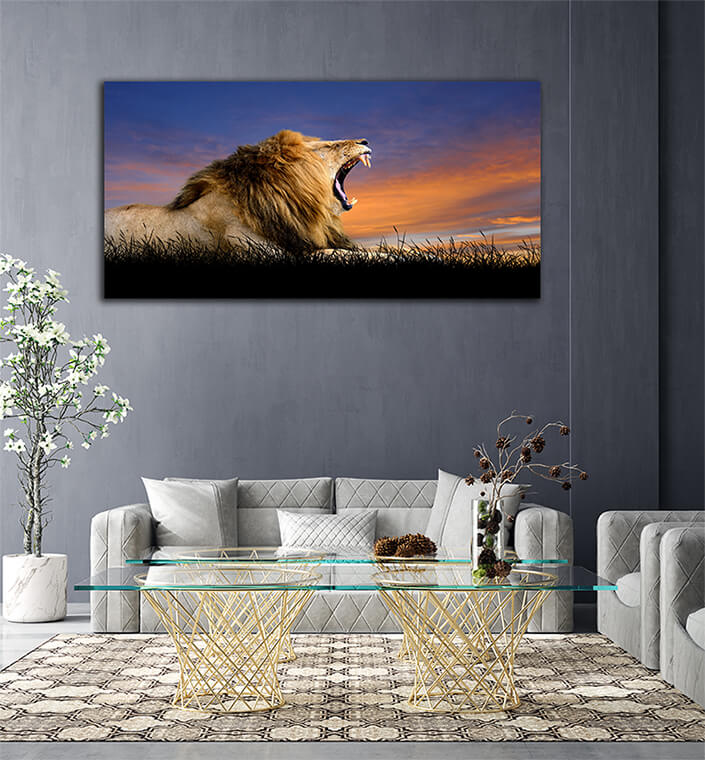 WEB006 0018 ML 0014 22639482 The lion on the background of sunset sky AOAY5556