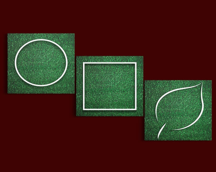 Q2 39656738 white circular, square leaf frame edge on green grass aoa14318