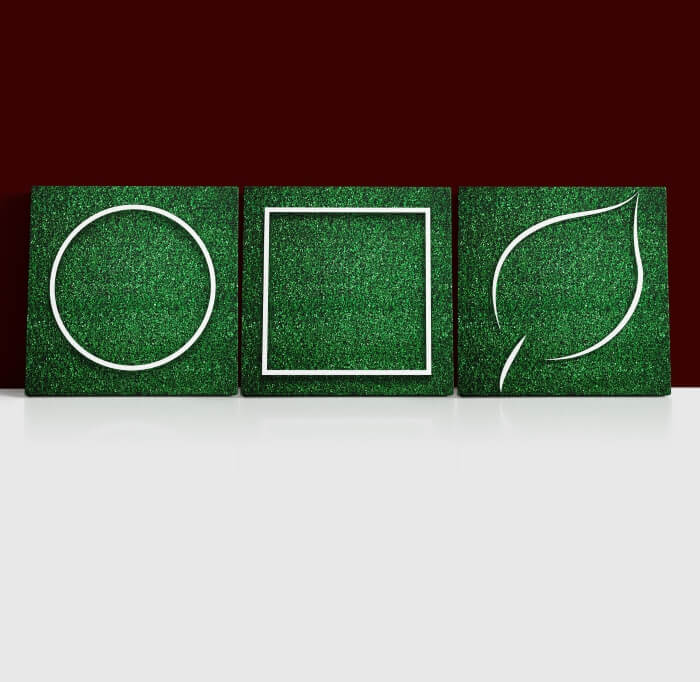Qq 39656738 white circular, square leaf frame edge on green grass aoa14318