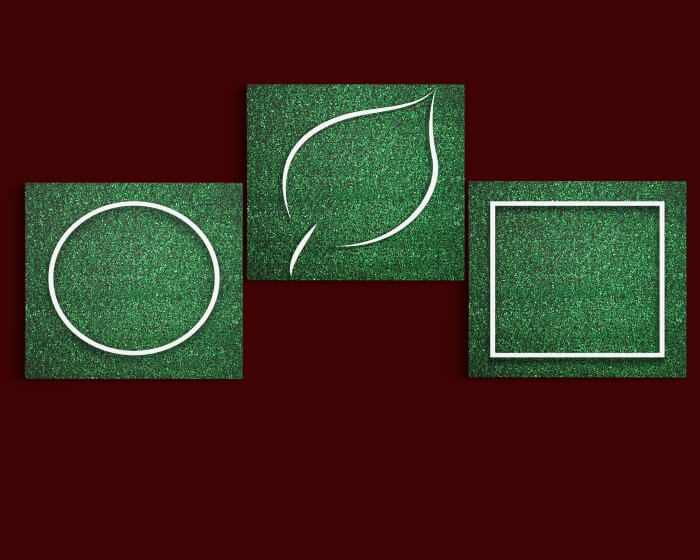 Qw2 39656738 white circular, square leaf frame edge on green grass aoa14318