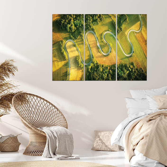 Q 0007 M3 AdobeStock 279716079 windy road in the summer aerial view AOA13010